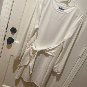 White balloons long sleeved dress with tied sash detailing at waist